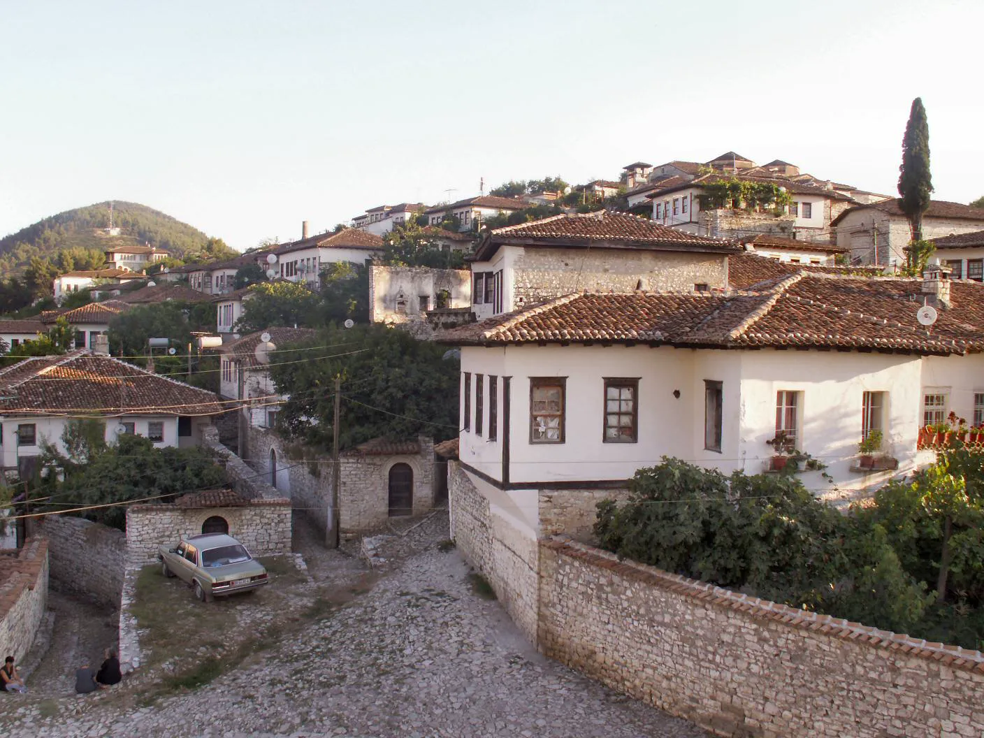 White Ottoman houses of Berat old town stacked above the Osum river
