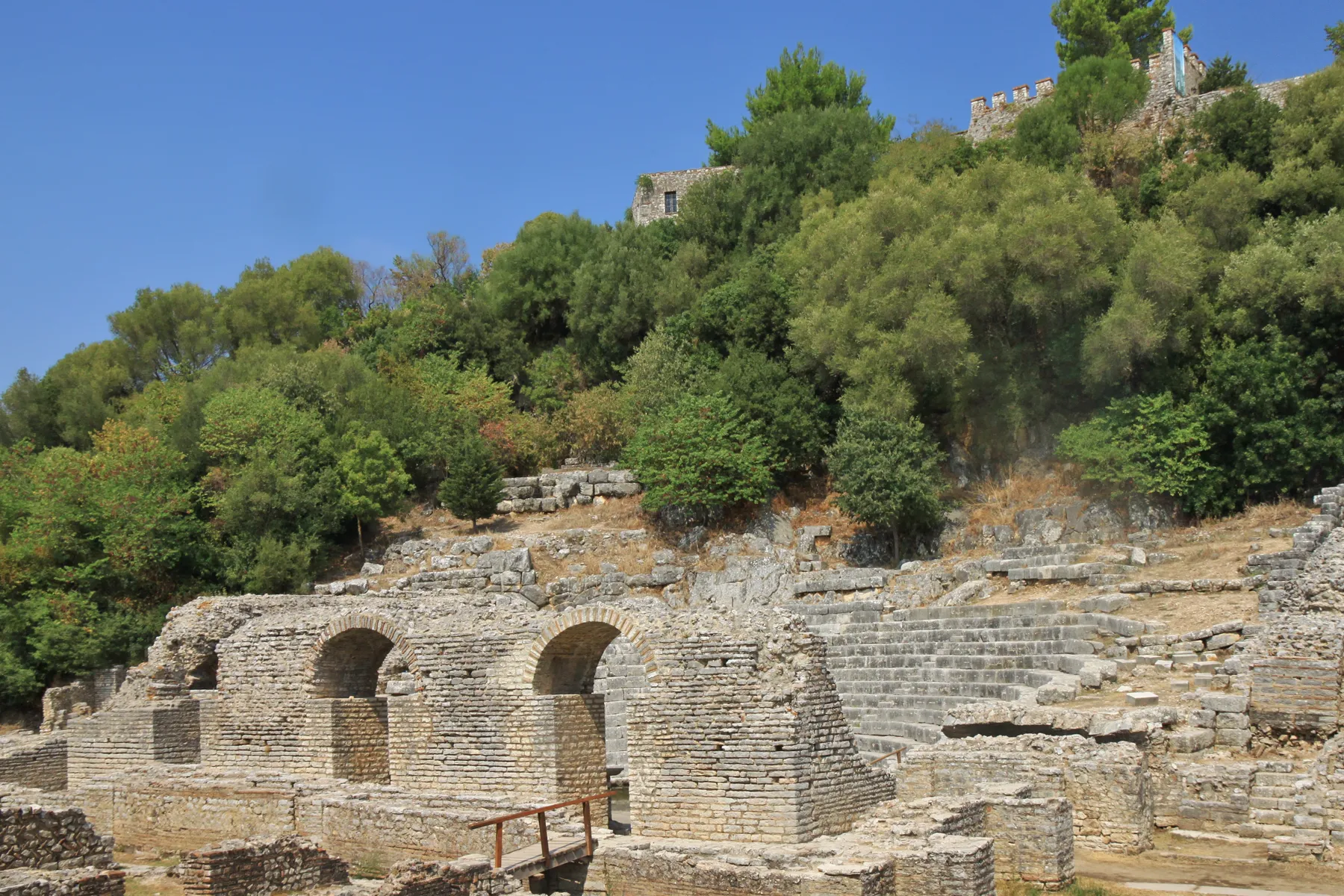 Ancient theatre and fortress at Butrint, a UNESCO site in southern Albania